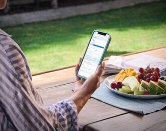 Close up of woman using MyENGIE app
